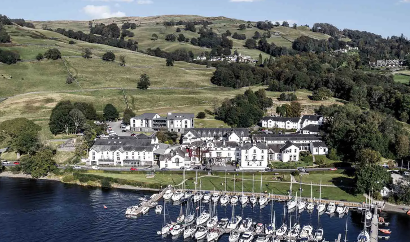 Aerial view of Low Wood Bay Resort and Spa and its marina on the shore of Windermere, Lake District